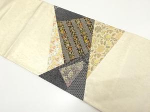 未使用品　本金　切りばめ草花模様織り出し　袋帯